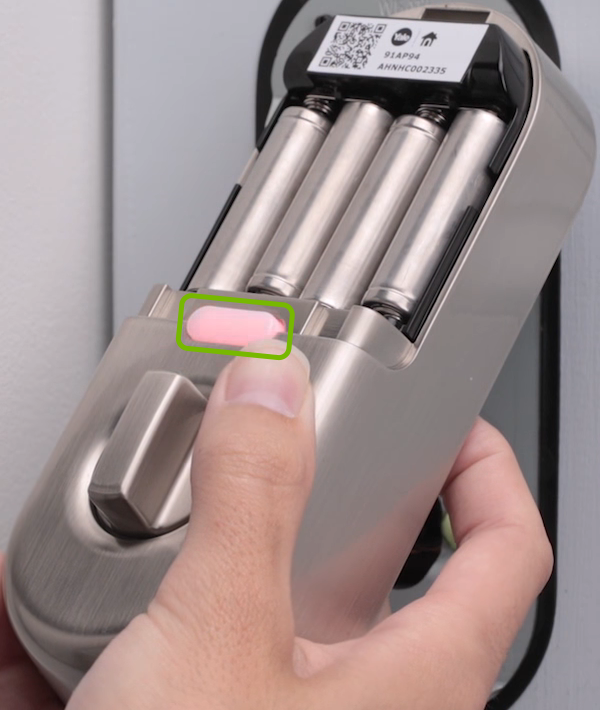 Front light turned red annotated on front of door lock.