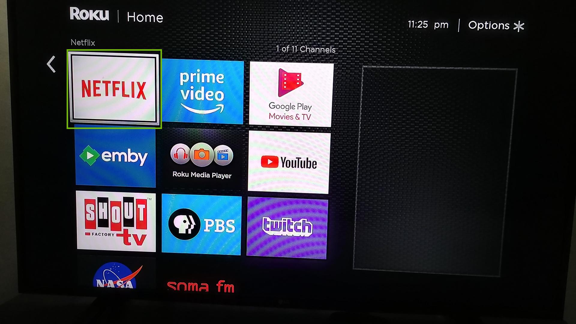 Roku TV home screen, highlighting an app being selected.