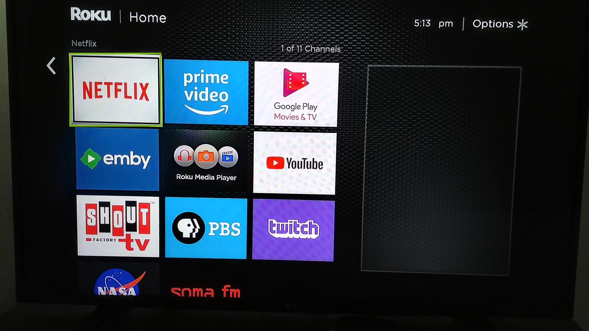 Roku TV home screen displaying a channel being highlighted.