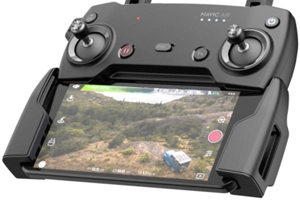 Smartphone connected to remote control showing camera view.