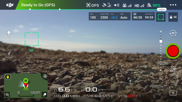 Record button highlighted in mobile app.