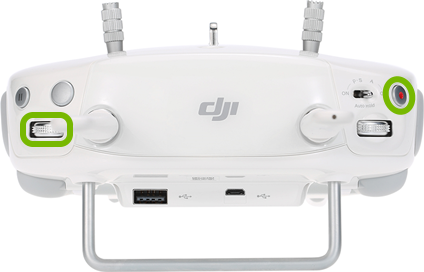 Record button and Camera Settings dial highlighted on the shoulders of the remote control.