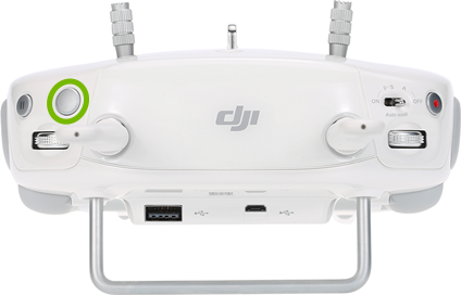 Shutter button highlighted on front of remote control.