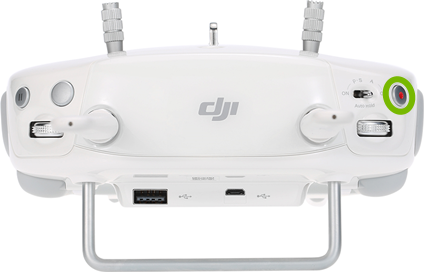 Record button highlighted on front of remote control.