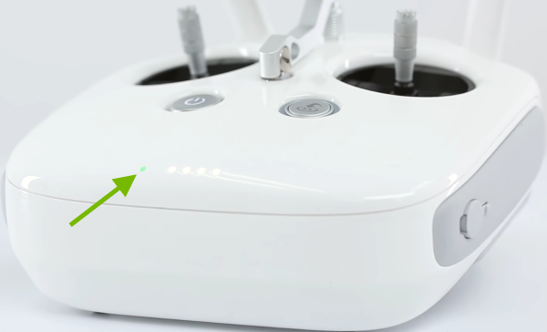 Remote control status indicator pointed out.