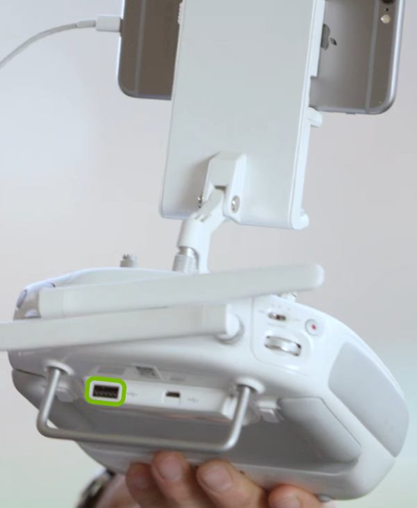 USB port highlighted on rear of remote control.