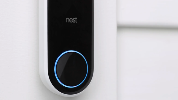 Doorbell button lighting up.