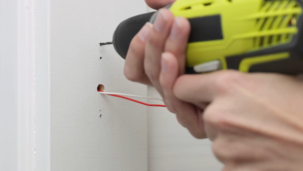 Drilling pilot holes.