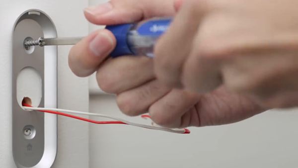 Screwing in the baseplate.