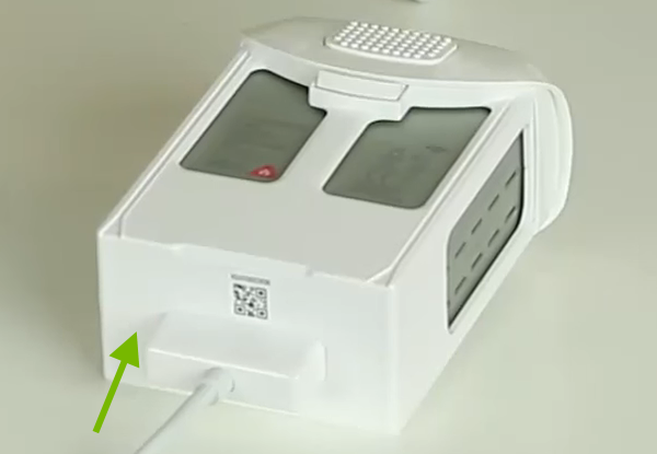 Charging cable connected to battery.