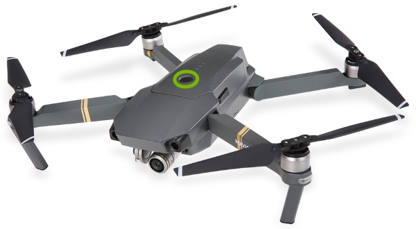 Power button highlighted on top of drone.