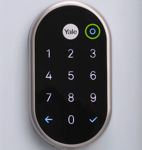 Gear wheel highlighted on lock keypad.