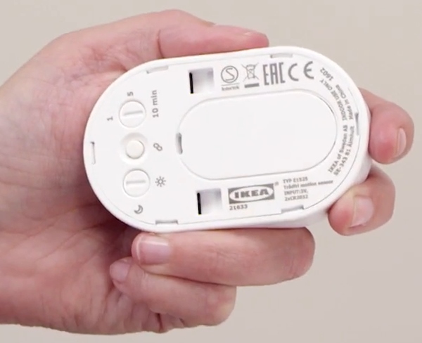 Rear of IKEA Tradfri motion sensor with battery cover in place.