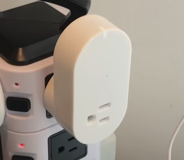 Ikea Tradfri control outlet plugged into power outlet.