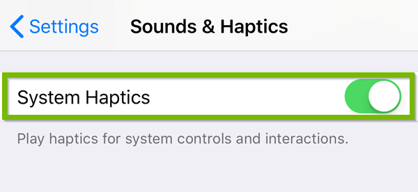 iOS Sounds and haptics menu highlighting the system haptics toggle switch.