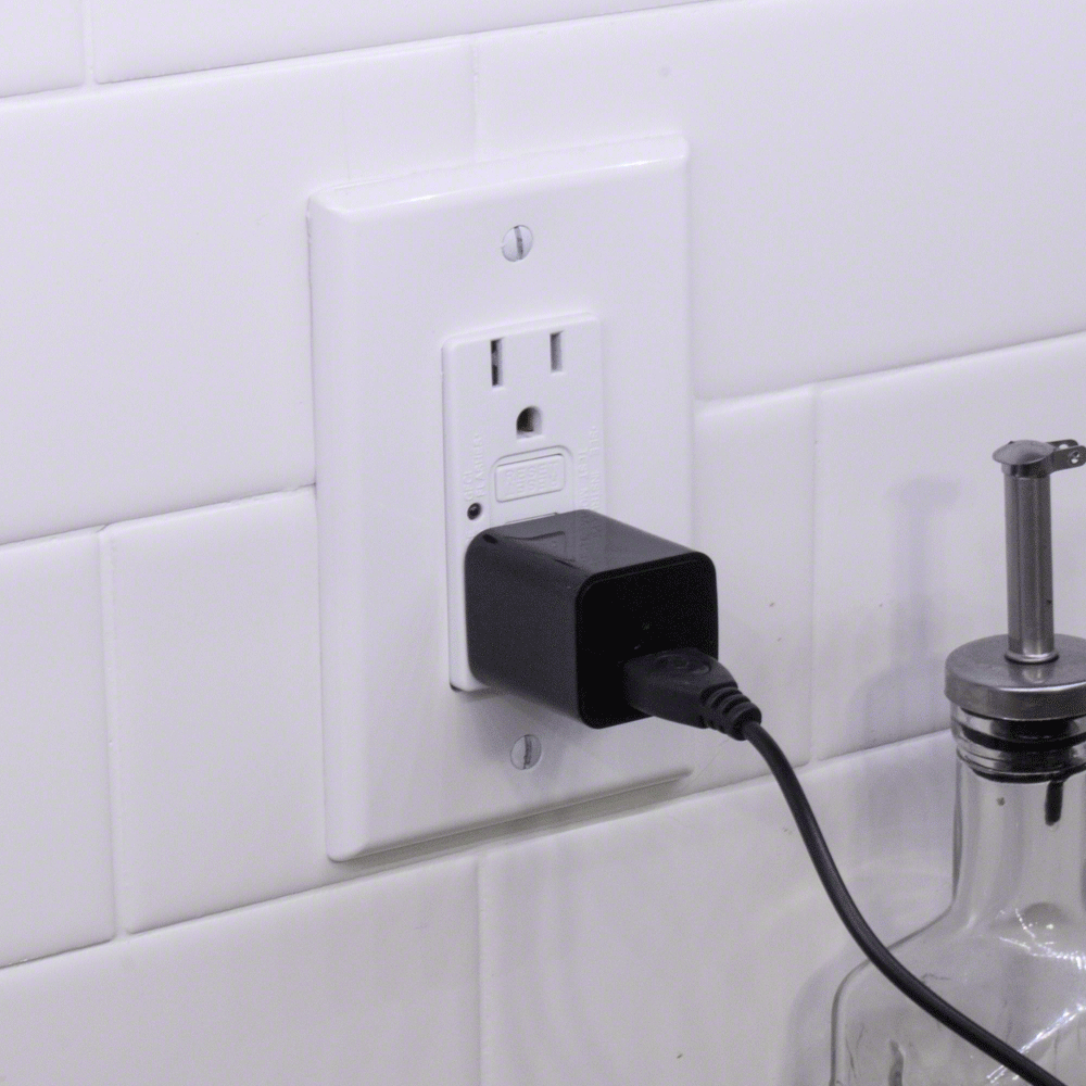 LeapFrog charger plugged into wall outlet.