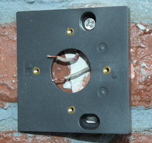 Screwing into the doorbell wedge