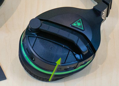Power button pointed out on the Turtle Beach Stealth 700 headset.