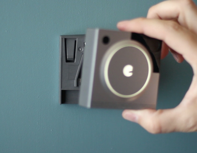 Reseating the camera into the mounting bracket. Illustration.