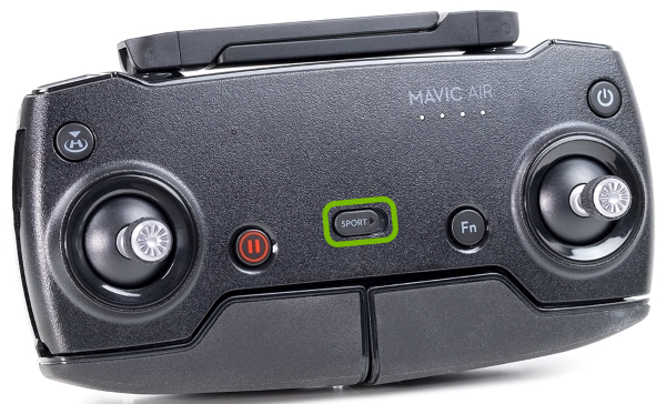 Flight mode switch highlighted on drone remote control.