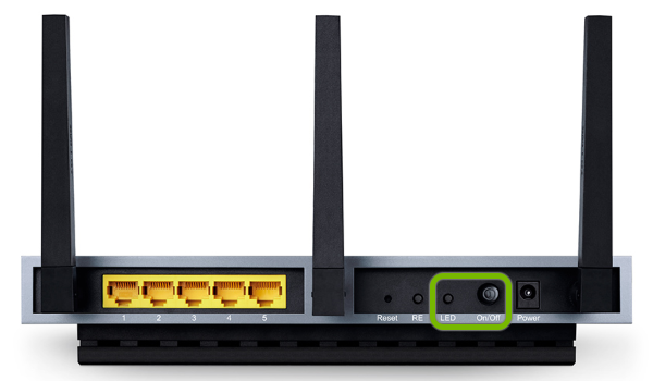 Power and LED buttons highlighted on side of TP-Link range extender.