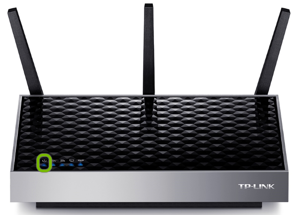 Power light highlighted on front of TP-Link range extender.
