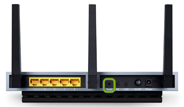 Pinhole with reset button highlighted on side of TP-Link range extender.
