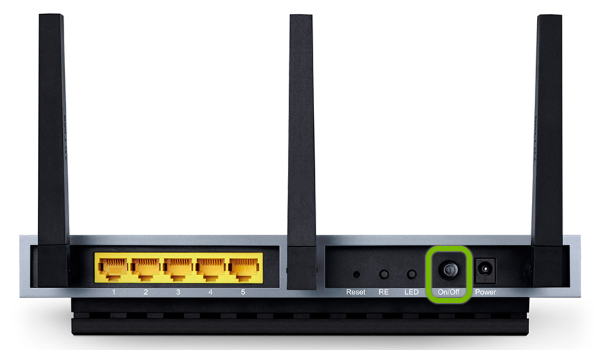 Power button highlighted on side of TP-Link range extender.