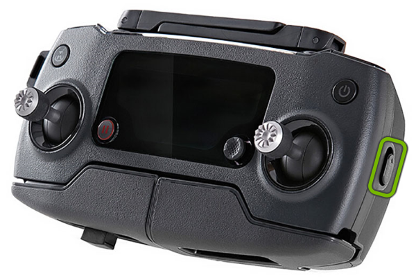 Flight mode switch highlighted on drone remote control.