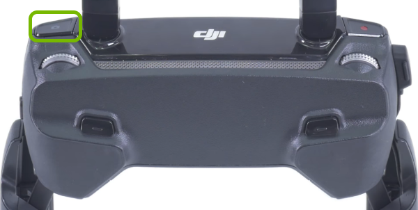 Shutter button highlighted on remote control.