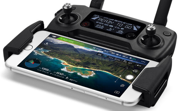 Smartphone connected to remote control showing camera view.