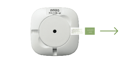 Removing the green tab from the room sensor