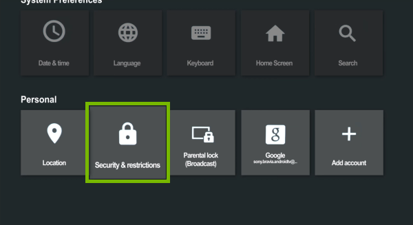 Security & restrictions options highlighted in Android TV settings.