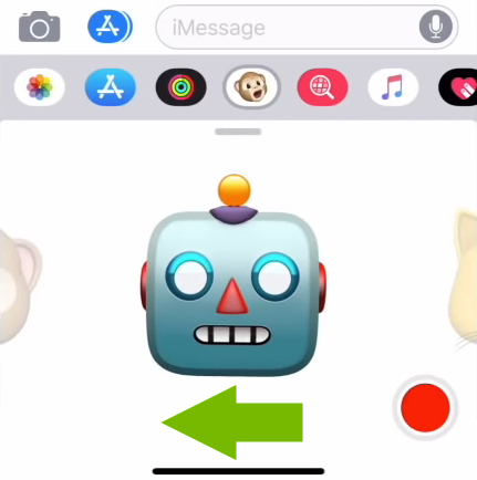 Green arrow showing direction to scroll in the Animoji menu on iOS.