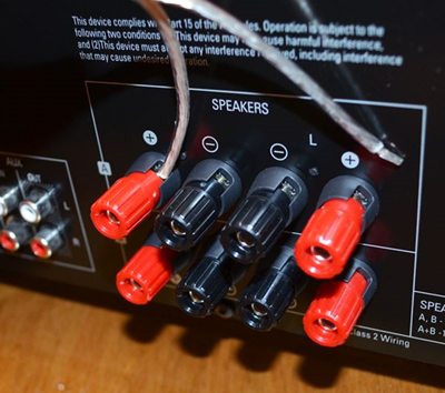AV Speaker wires being tightened