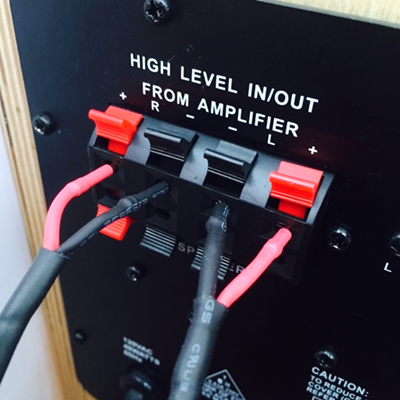 Spring loaded clips for speaker wires