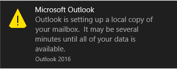 Outlook setting up a local copy of your mailbox popup.