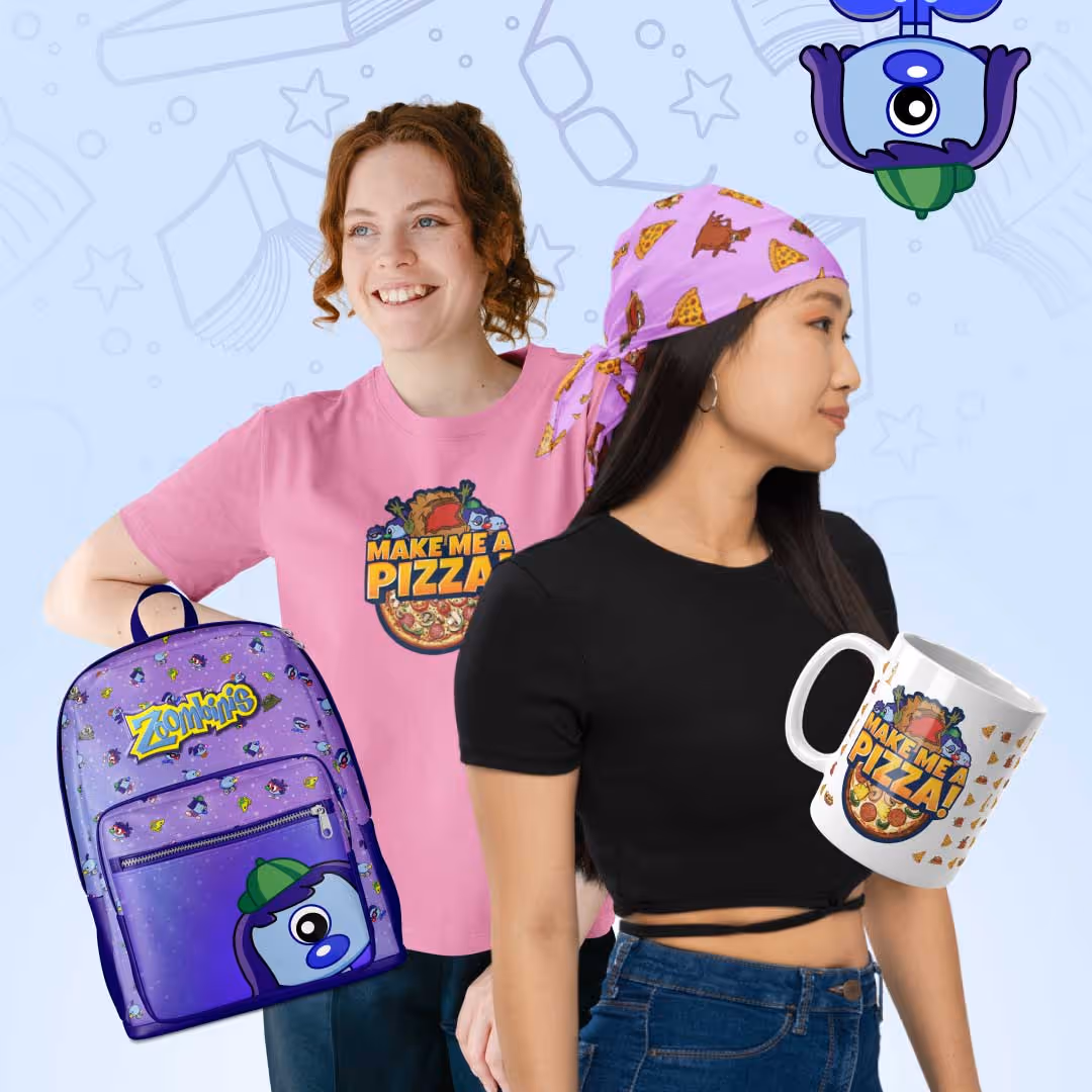 Two women wearing Zoombinis merch, holding a mug and backpack, with pizza-themed designs.