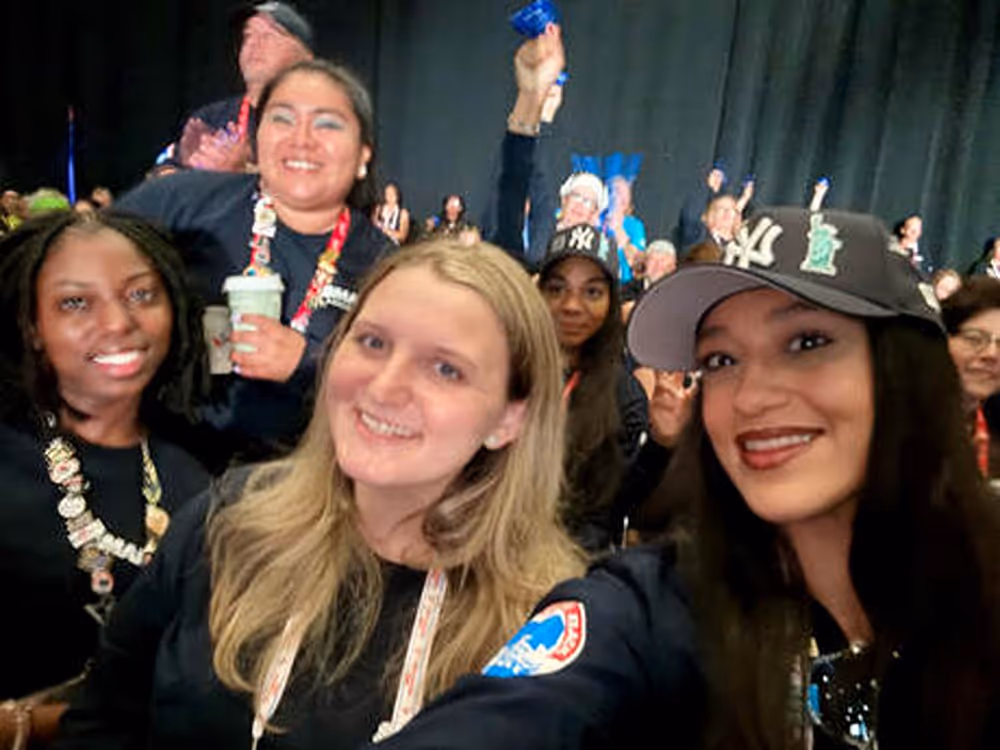 Local 28 Women’s Committee members smiling together at the September 2025 Tradeswomen Build Nations Conference in Chicago.