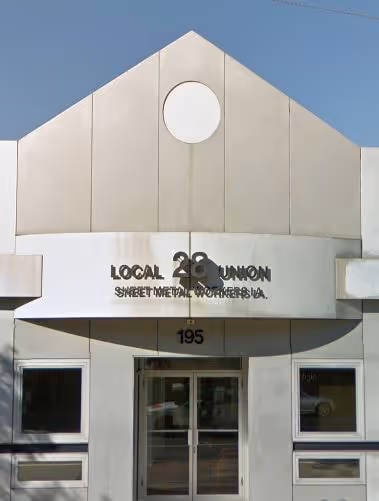Front entrance of a building with a sign reading Local 28 Union Sheet Metal Workers U.A.