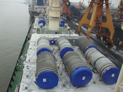 Large cargo sitting on deck of ship