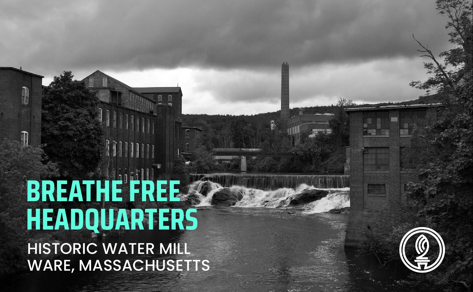 Black and white photo of the historic water mill in Ware, Massachusetts with Breathe Free headquarters branding by Tommy Wisdom