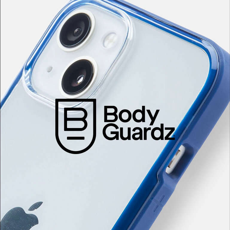 Close-up of BodyGuardz iPhone case with logo overlay, featuring product brand photography and packaging design by Studio Wisdom