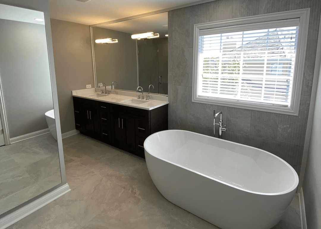 Backyard patio with a wooden pergola, ceiling fan, and built-in outdoor kitchen.