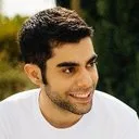 A young man smiling