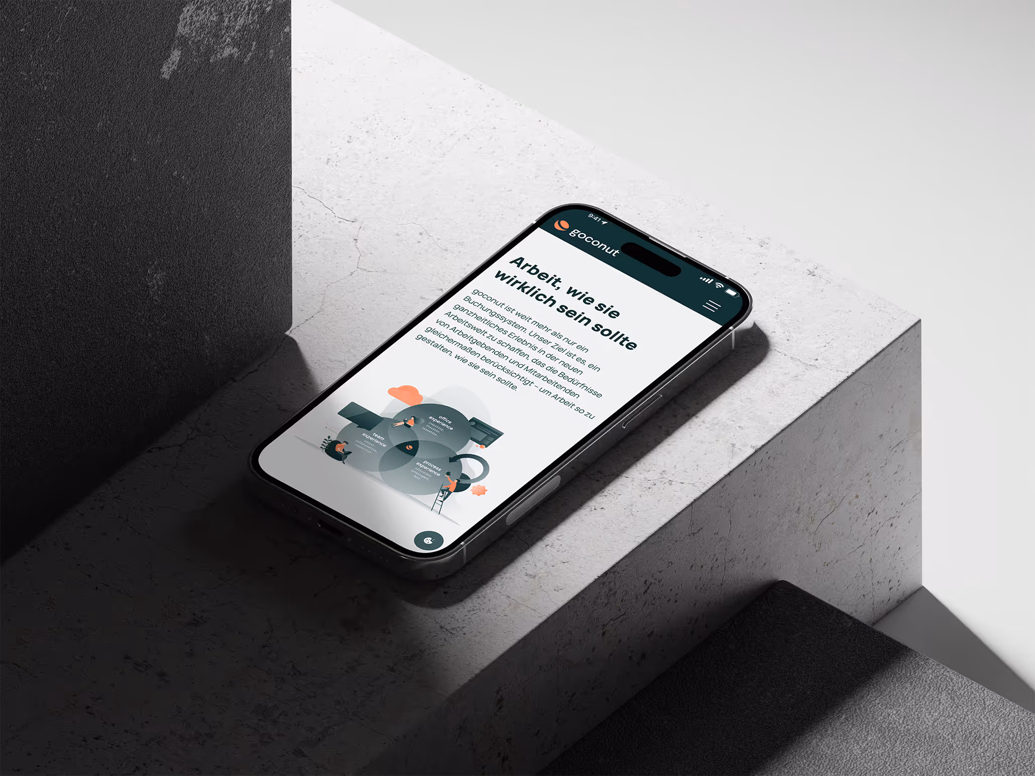 Ein Iphone liegt auf einer Beton-Stufe, darauf zu sehen die geöffnete Goconut-Website 