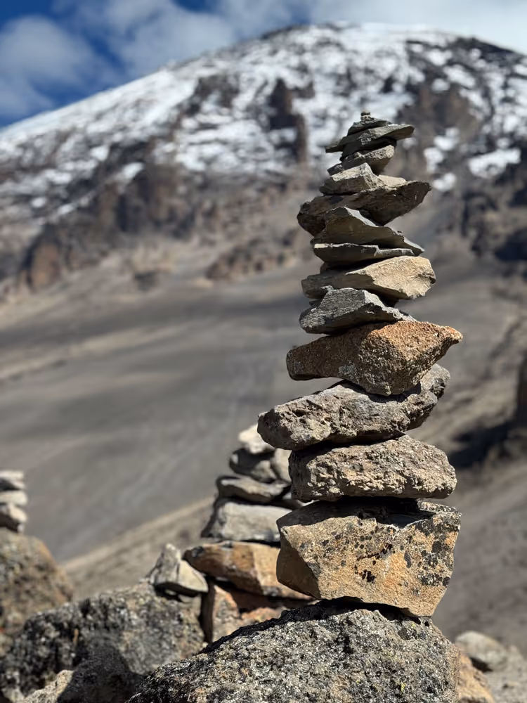 A stack of rocks on the path up to Uhuru Peak, Mount Kilimanjaro