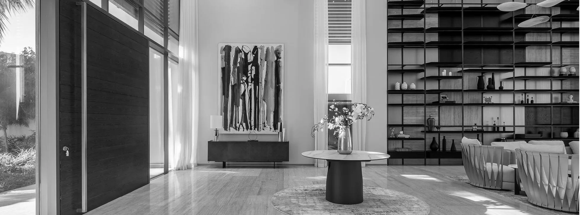 Luxury interior fit out of a villa in Palm Jumeriah with custom shelving, modern decor, and premium marble flooring.