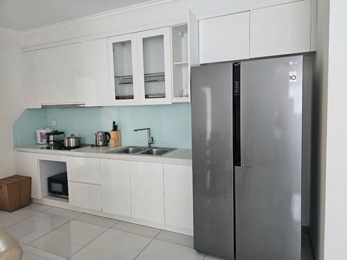 initial kitchen with refrigerator