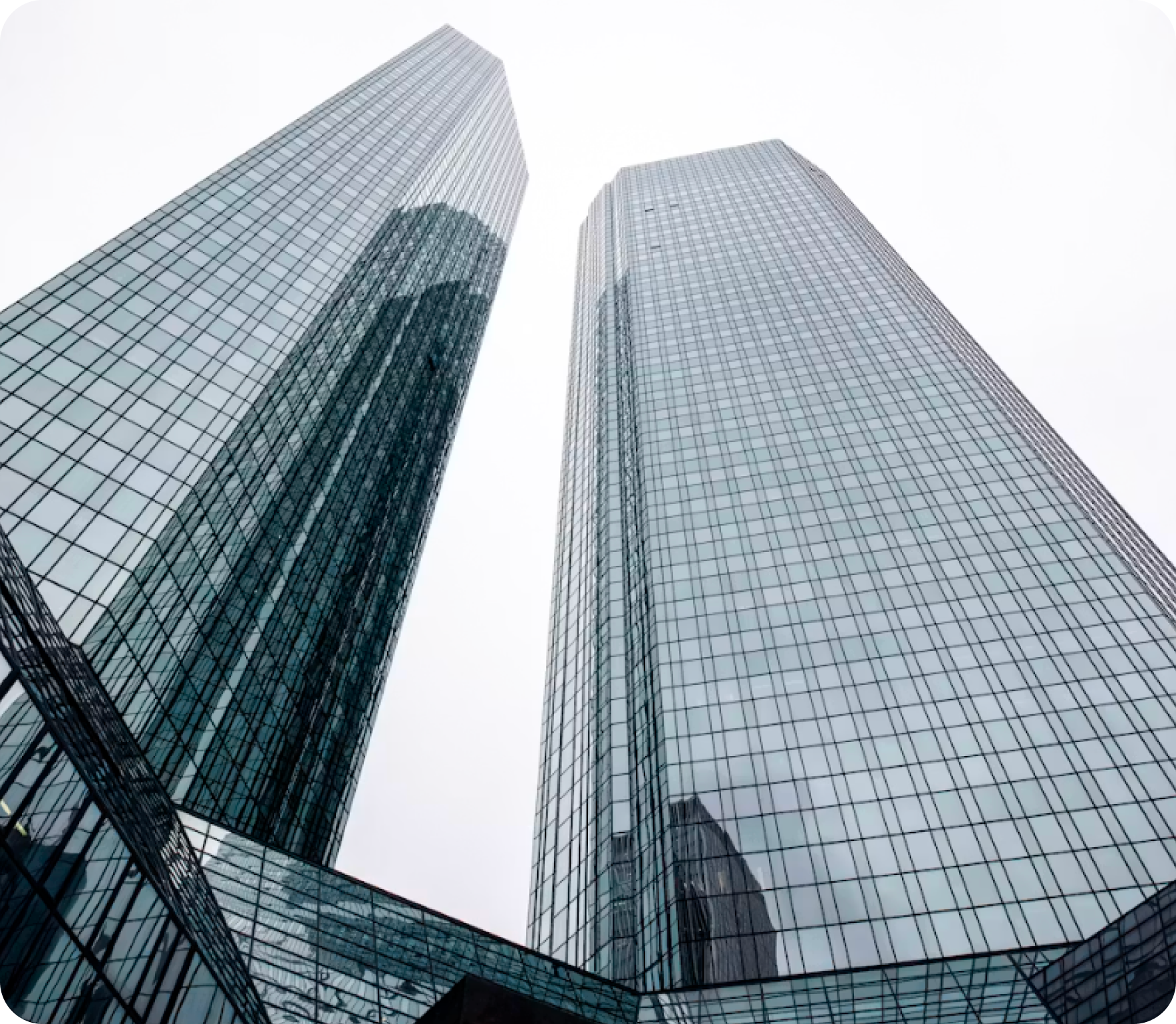 Glass office towers seen from below